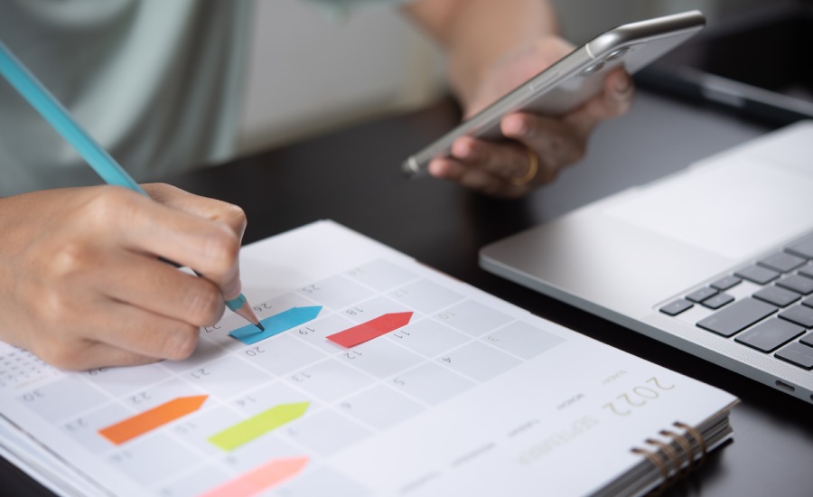 A man checking a calendar​