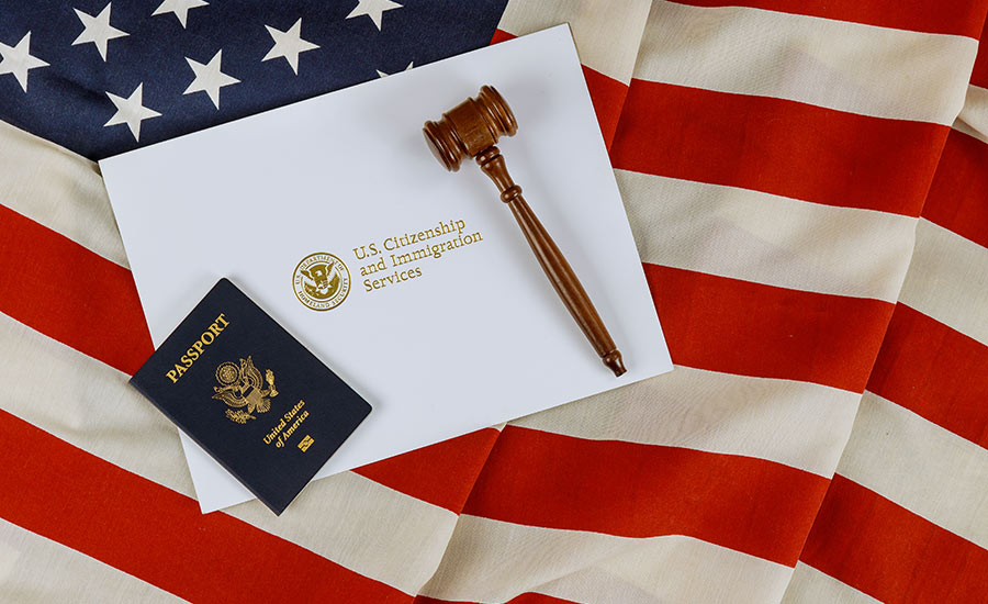 A U.S passport, the American flag and a gavel​