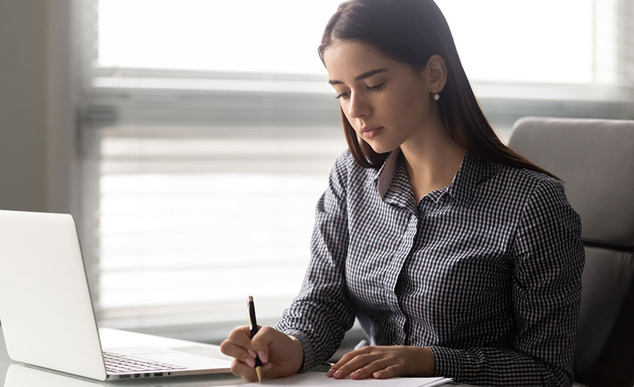 A young woman preparing to file Form I-824​