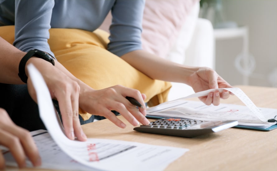 A couple calculating their income​