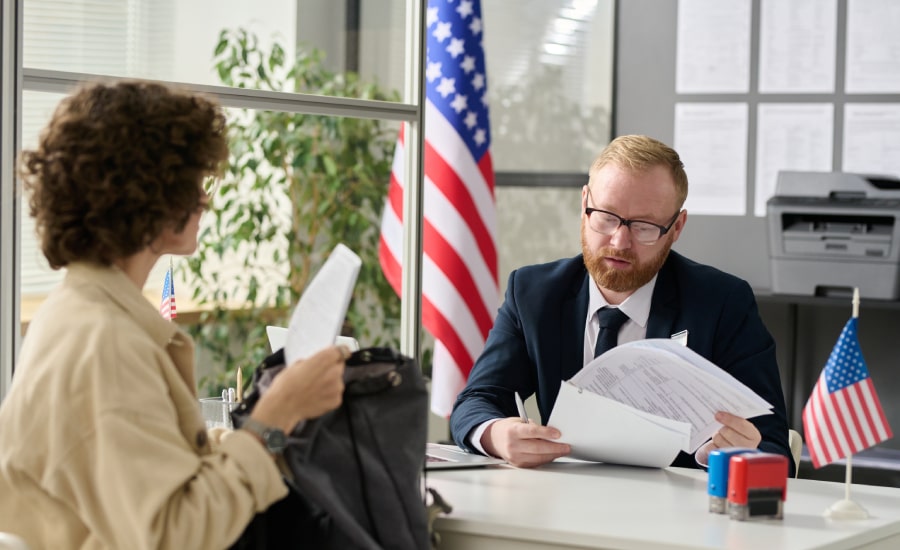 A young woman applying for a visa