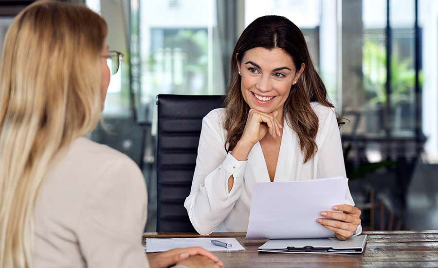 A female employer interviewing a woman​