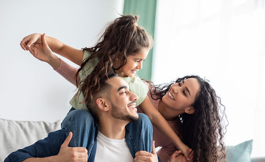 A happy family with a daughter​