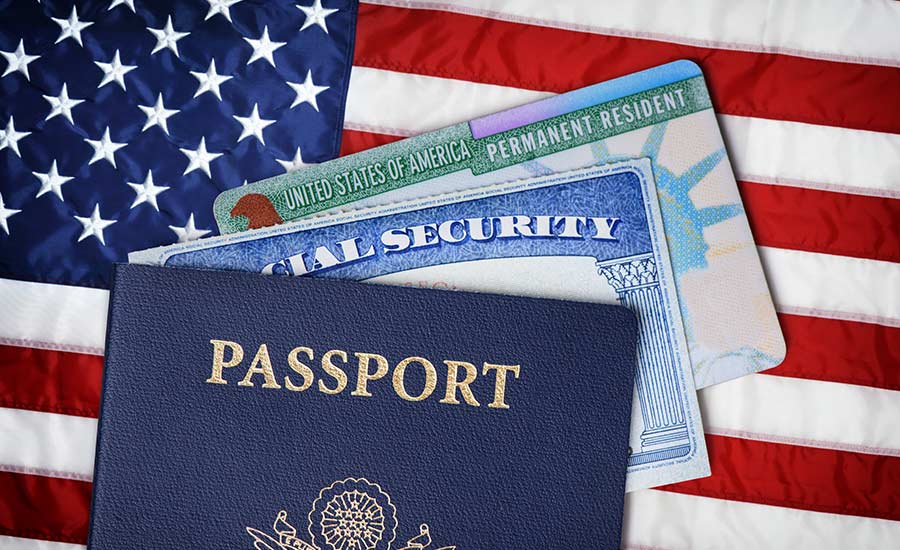 The U.S. flag, passport, Green Card and social security card​