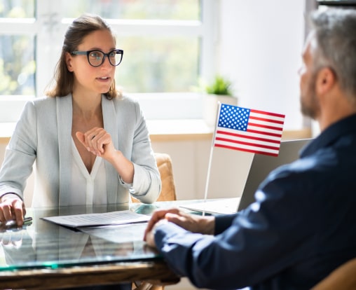 attorney talking to her client