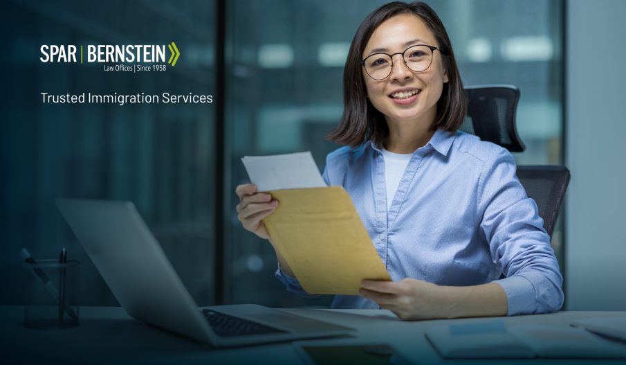 A female employer surrounded by documents